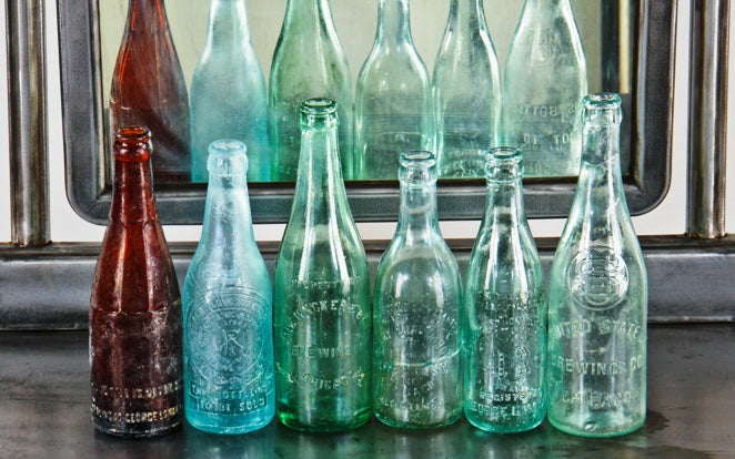 variety of antique c. 1900-1915 machine-made glass crown capped beer bottles fabricated for chicago bottlers