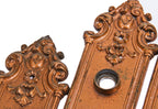 two matching original late 19th century original "pasco" pattern interior residential ornamental cast iron door escutcheons with a copper-plated finish throughout