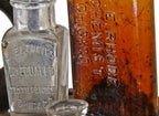 nice assortment of original late 19th and early 20th century original chicago privy-dug druggist bottles with bold and deeply embossed markings