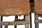 largely intact and well-maintained early 20th century freestanding fully adjustable patented chicago state street department store dress-form with intact swivel casters