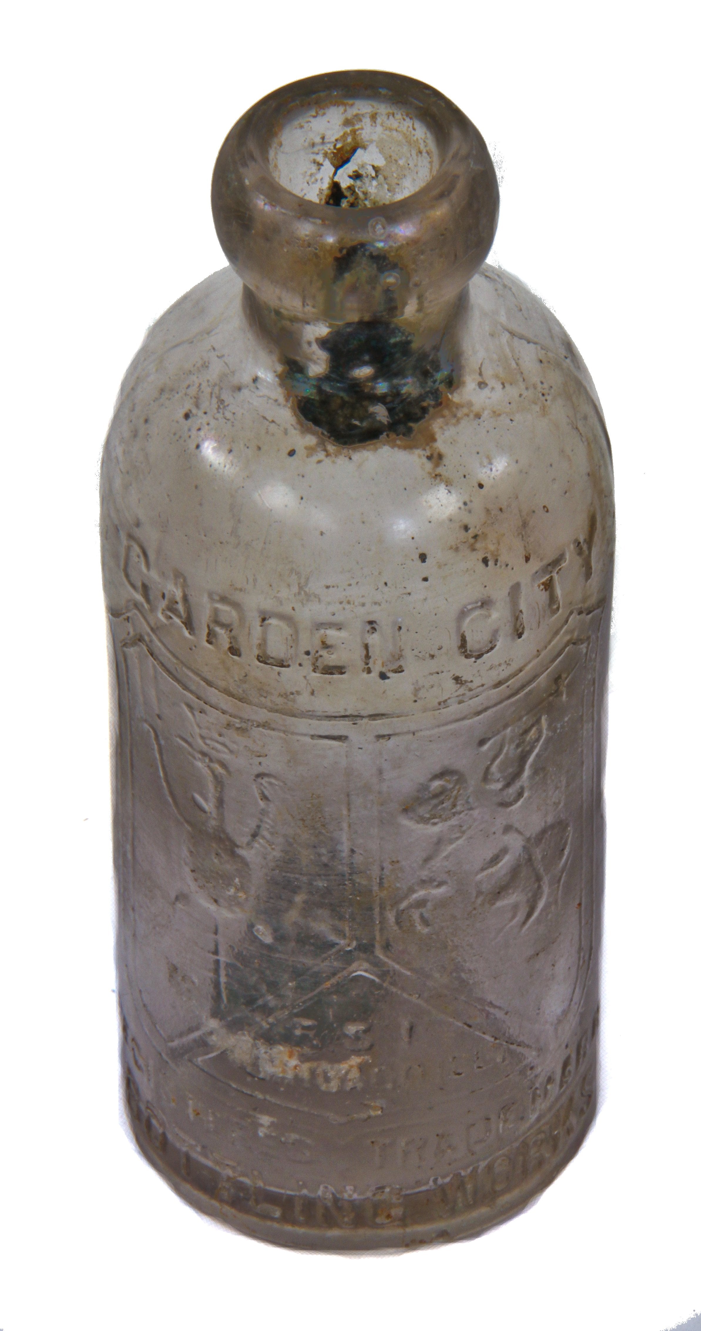 hard to find all original turn of the century hutchinson-style colorless glass blobtop soda or mineral water bottle fabricated for the garden city bottling company of missoula, montana.