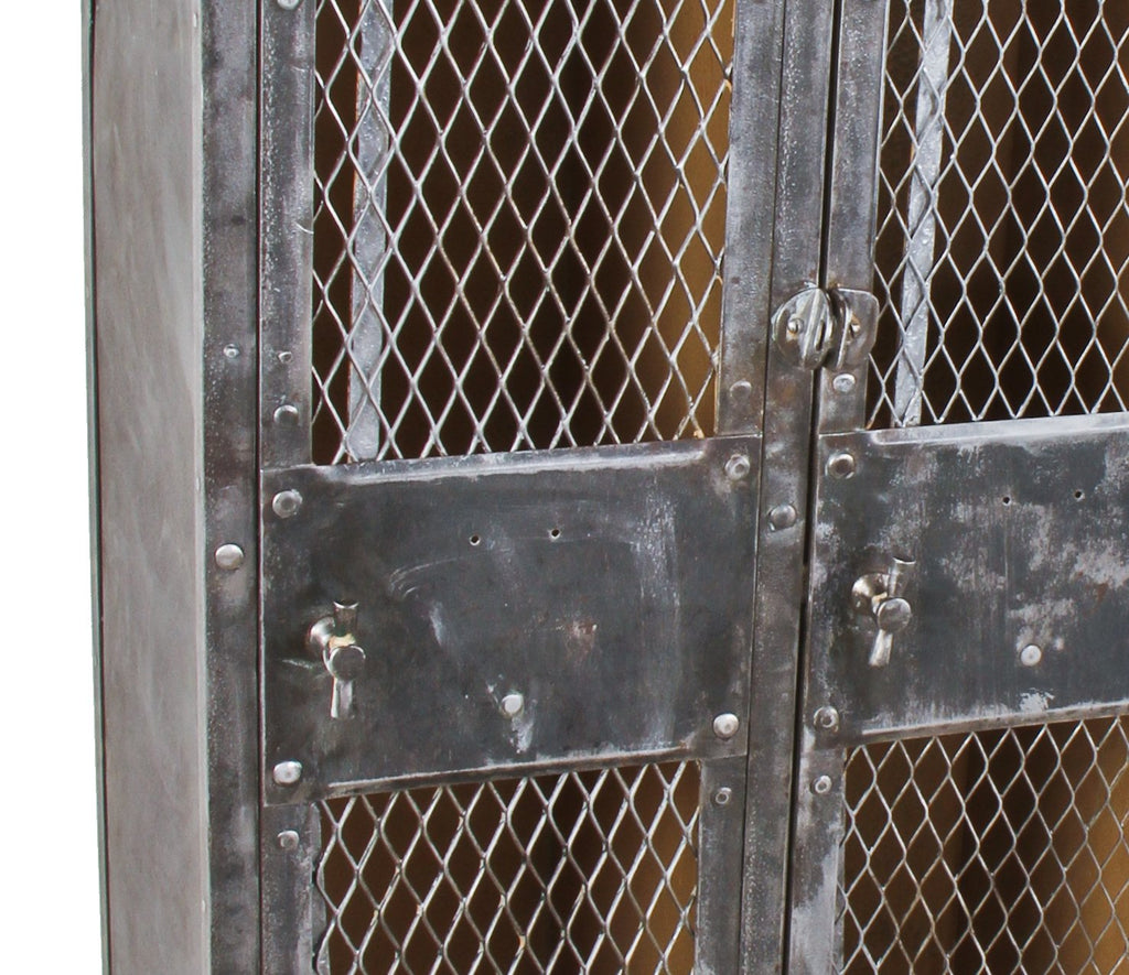 highly desirable early 20th century american industrial 3-unit freestanding cold-rolled riveted joint sheet iron factory lavatory locker with diamond steel mesh doors
