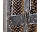 highly desirable early 20th century american industrial 3-unit freestanding cold-rolled riveted joint sheet iron factory lavatory locker with diamond steel mesh doors