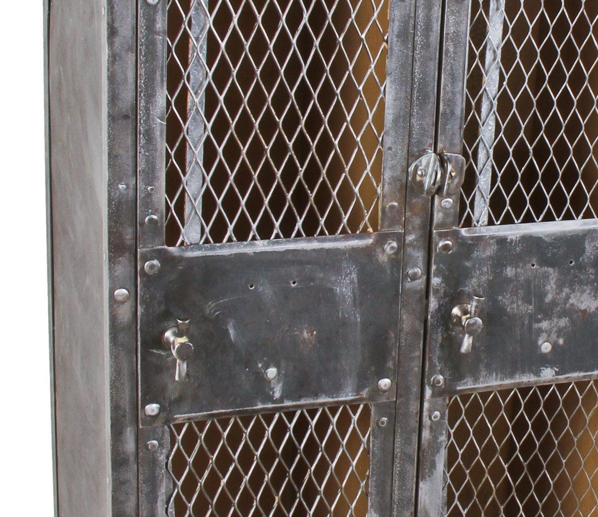 highly desirable early 20th century american industrial 3-unit freestanding cold-rolled riveted joint sheet iron factory lavatory locker with diamond steel mesh doors