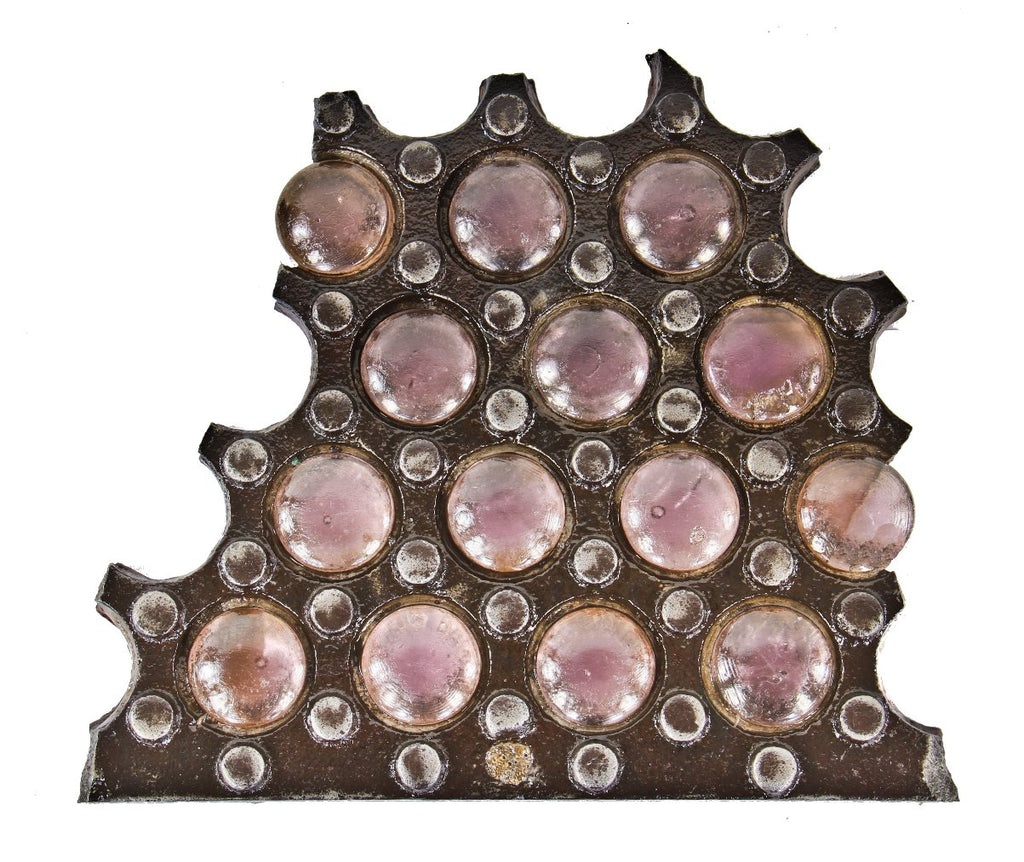 single hard to find and highly collectible original 19th century brown brothers sidewalk vault panel fragment with distinctive embossed lettering on each of the "sun-purple" lenses