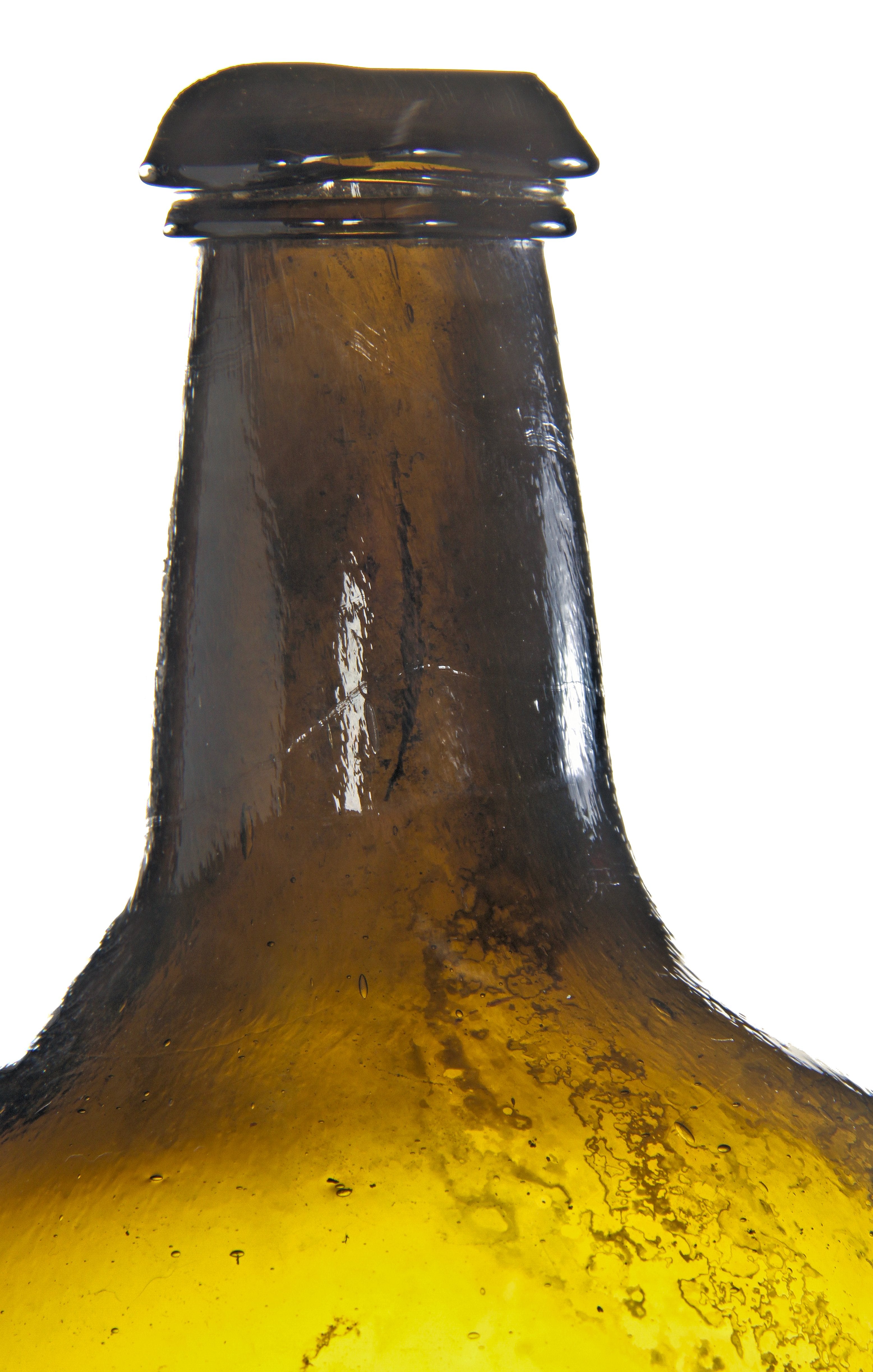 very rare and all original antique early nineteenth century free-blown and iron pontiled deep olive amber glass bottle manufactured for unknown bottler