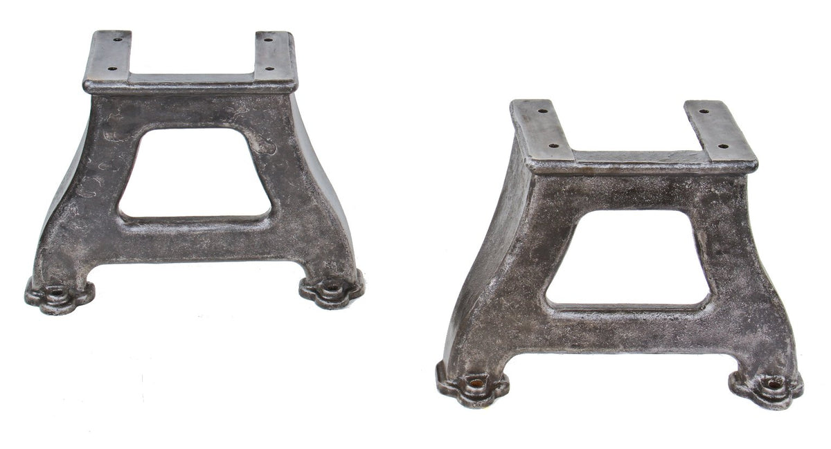 two matching hard to find and sought after heavy duty c. 1916 original interior factory flat turret lathe machine bases or legs with distinctive and curvaceous feet
