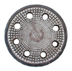 original 19th century city of chicago commercial building ornamented cast iron sidewalk coal chute circular-shaped cover with a multitude of holes once containing glass vault lenses