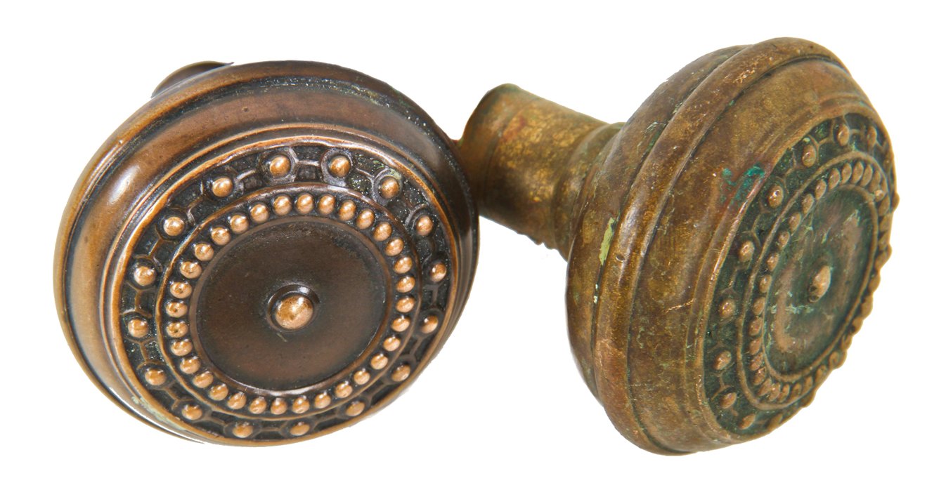 set of original antique american interior residential wrought brass "como" pattern passage size banded rim doorknobs with a bead design motif