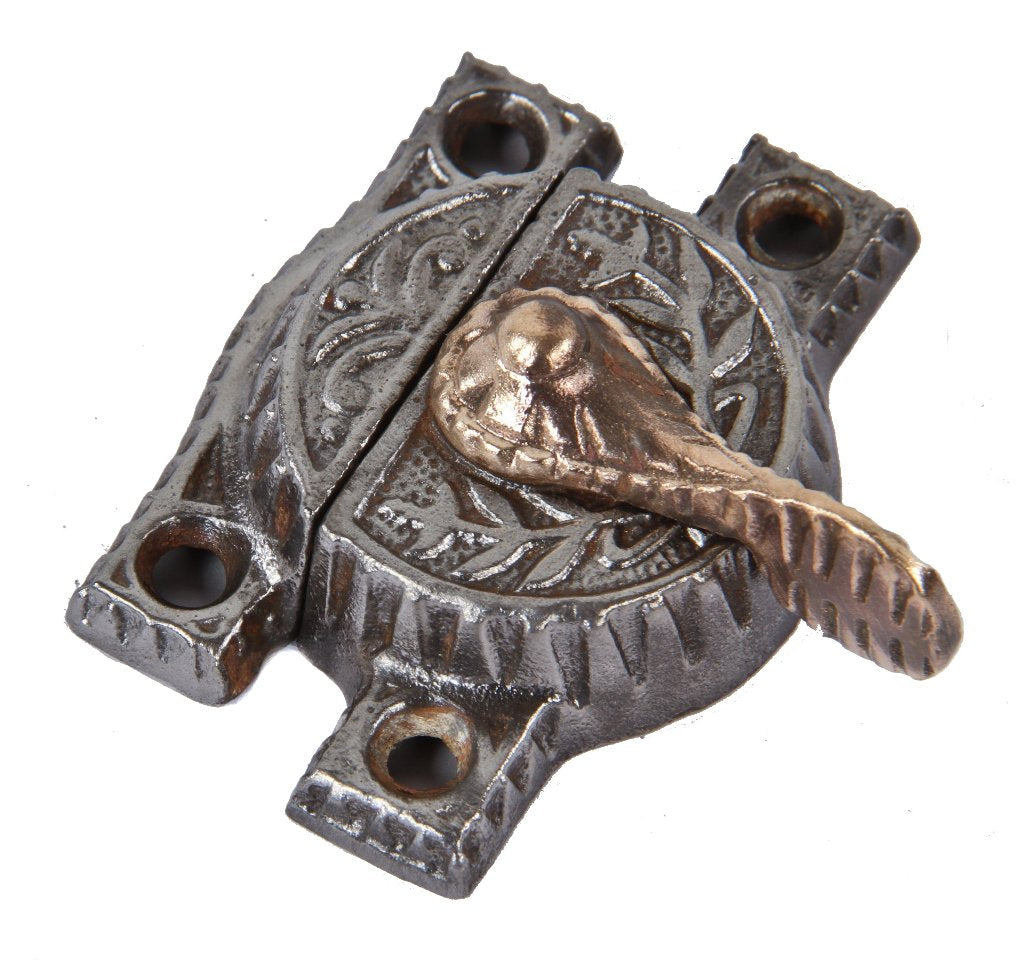 refinished late 19th century antique american ornamental cast iron interior residential cast iron and brass window sash lock with intact matching keeper