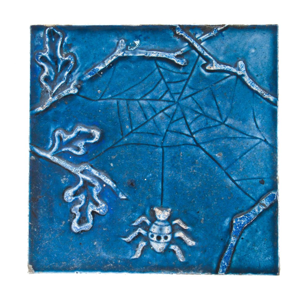 original c. 1885-87 antique american richly colored egyptian blue color majolica glazed interior residential fireplace tile featuring an embossed spider with web