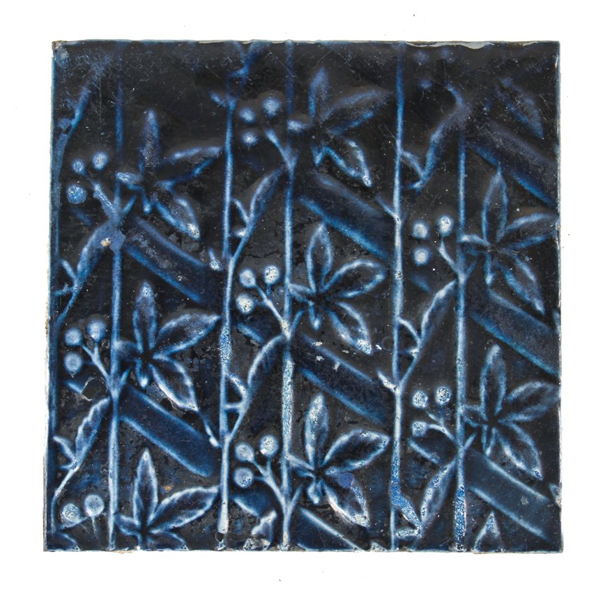 original antique american dark cobalt blue majolica glazed interior residential fireplace hearth tile with allover leafage and clusters of berries