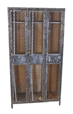 one of three matching original early 20th century american industrial "expanded" steel mesh freestanding cold-rolled sheet iron locker with a plurality of interior hooks