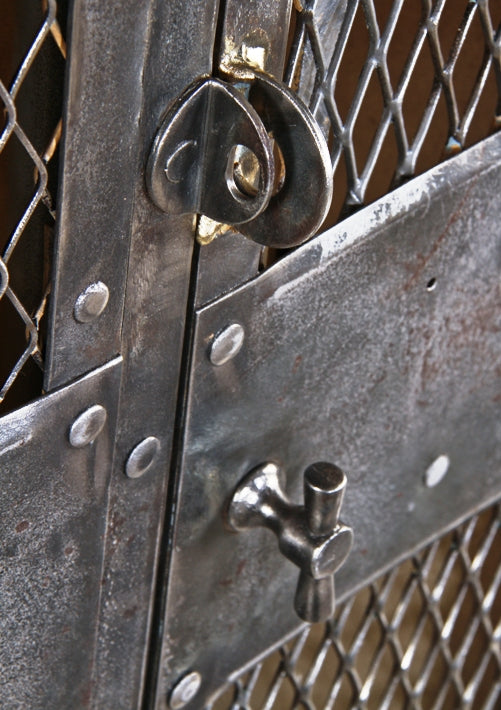one of three matching original early 20th century american industrial "expanded" steel mesh freestanding cold-rolled sheet iron locker with a plurality of interior hooks