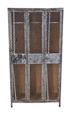 c. early 20th cent freestanding 3-unit antique american industrial cold-rolled riveted joint sheet iron factory locker with desirable brushed metal finish