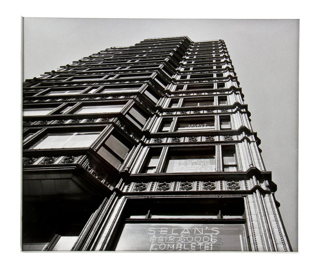 untitled 8 x 10 signed richard nickel gelatin silver print or photograph depicting the facade of the extant reliance building with neon sign in forefront