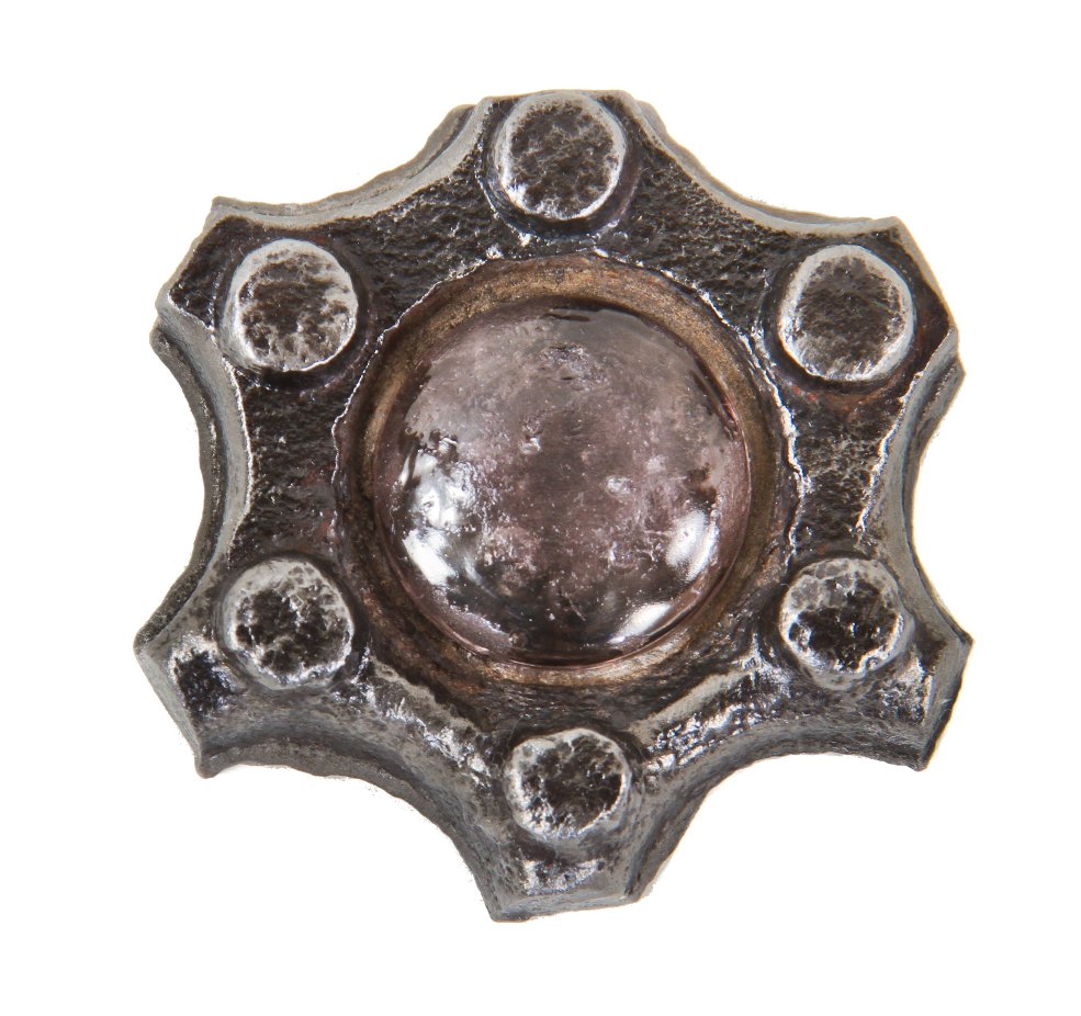 repurposed late 1870's american industrial city of chicago sidewalk cast iron vault lens panel fragment reconfigured into a paperweight or coaster