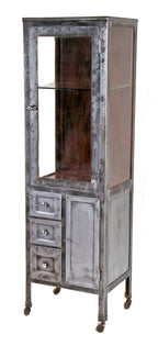 highly sought after all original early 20th century freestanding mobile heavy gauge steel american antique medical operating room storage cabinet with glass sidelights