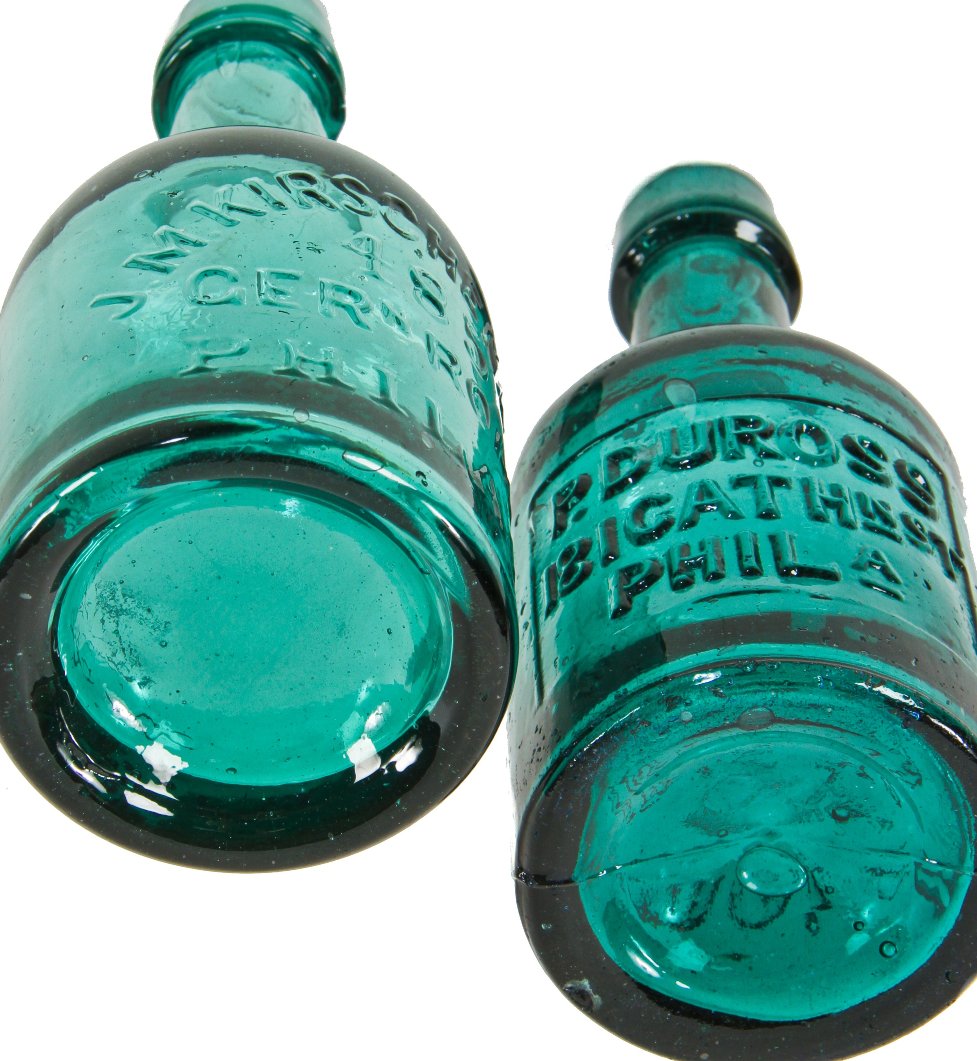 original c. 1855-65 brilliantly colored emerald green p. duross "brown stout" squat bottle with distinctive crudity and applied slopping collar with single ring