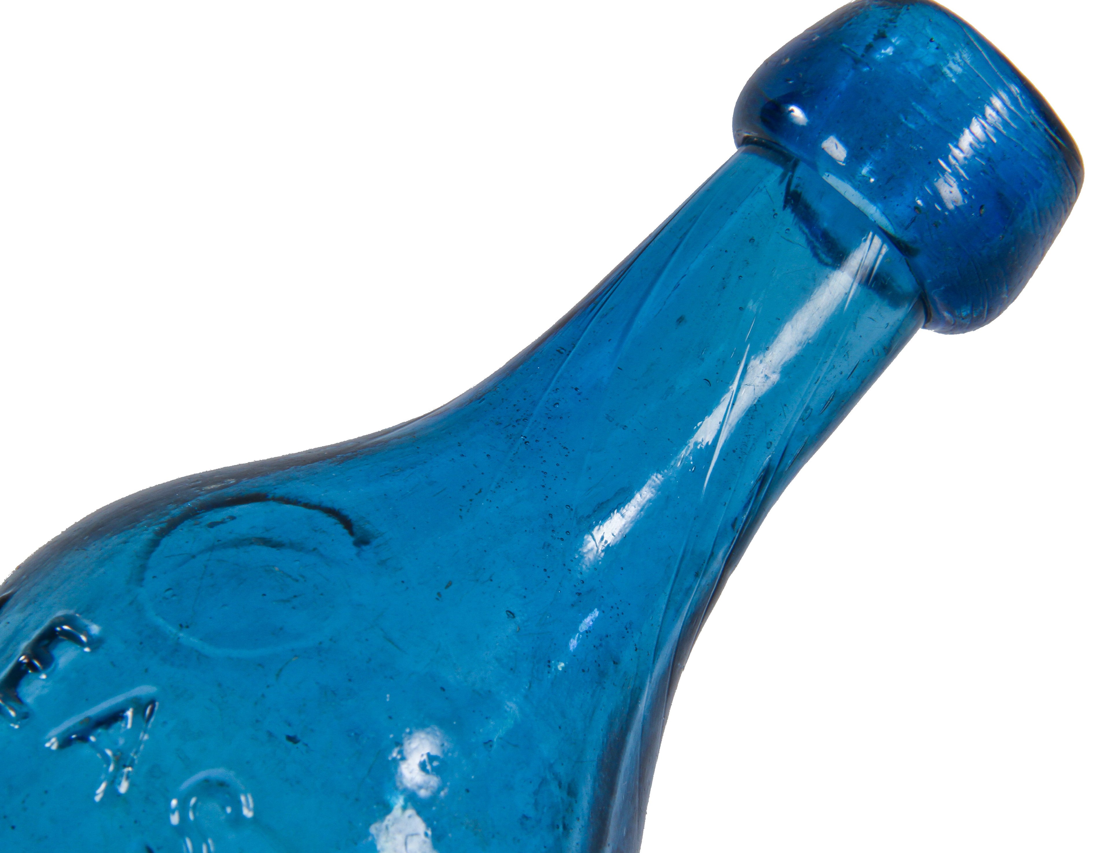 original mid-nineteenth century crude vibrant sapphire blue soda or mineral water blobtop bottle with backwards lettering manufactured for f. gleason in rochester