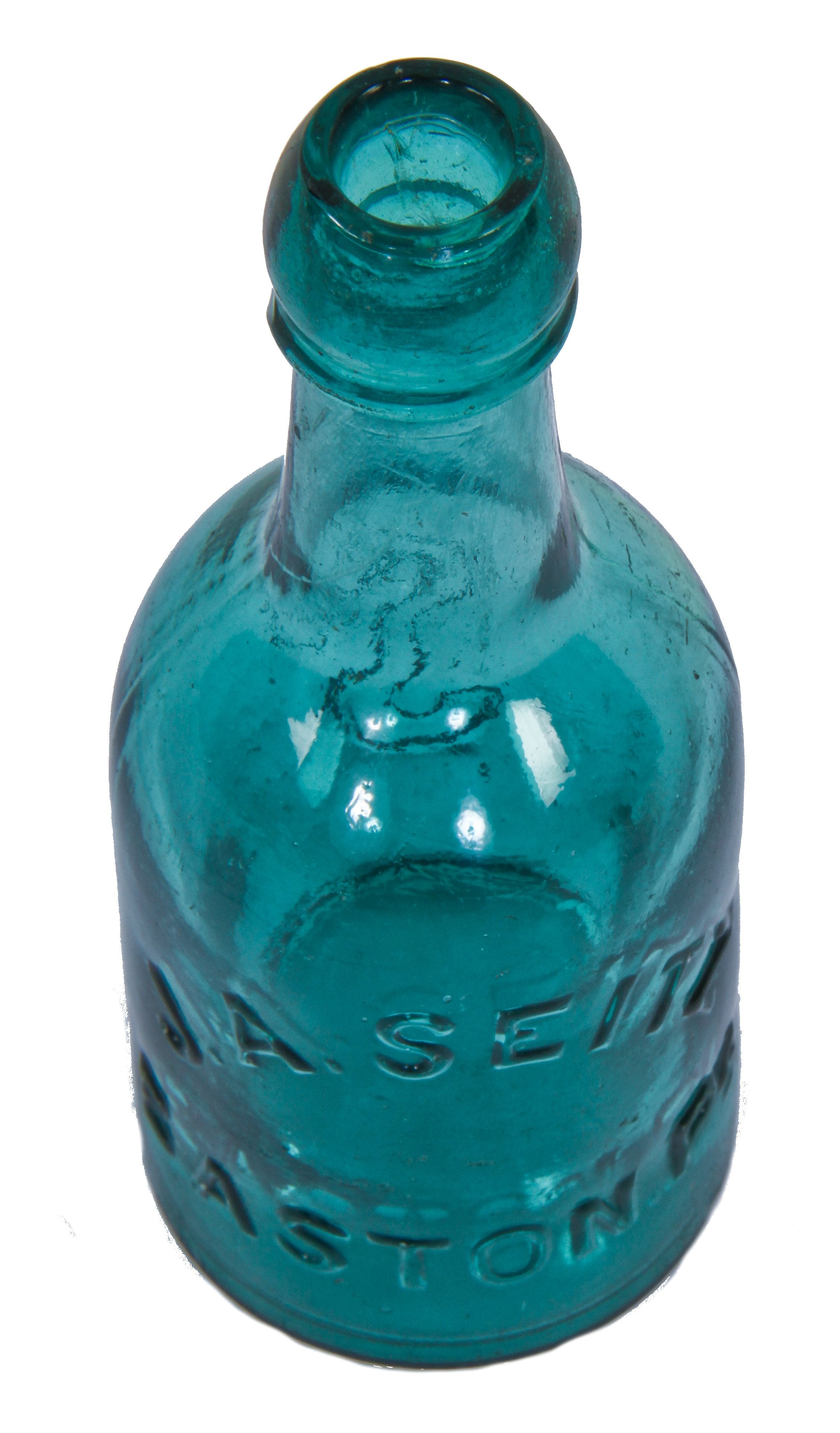 rare original mid-nineteenth century medium blue green porter shaped bottle finished with an unusual intact blob top and ring manufactured by pennsylvania area glassworks for john a. seitz.