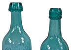 rare original mid-nineteenth century medium blue green porter shaped bottle finished with an unusual intact blob top and ring manufactured by pennsylvania area glassworks for john a. seitz.