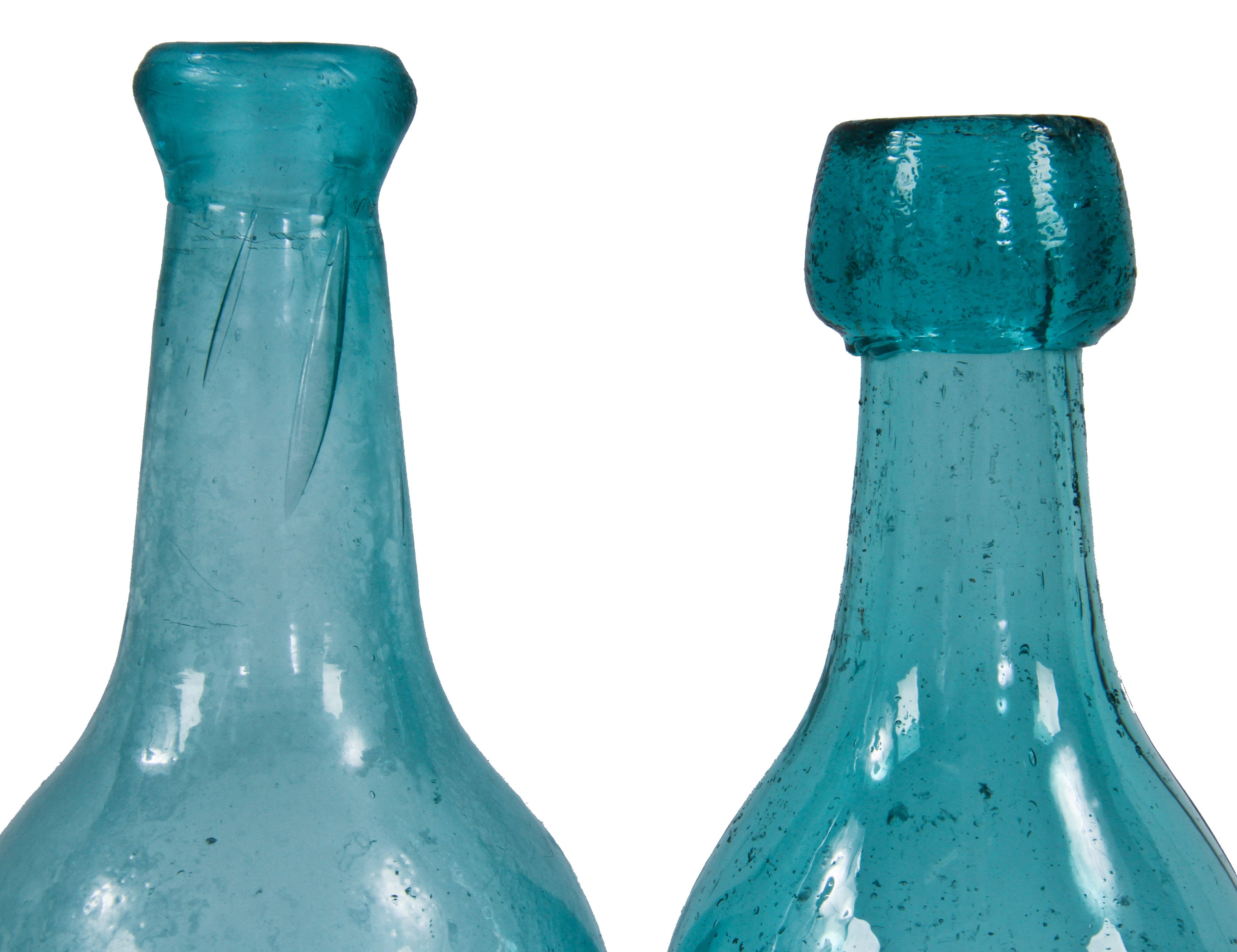 original and intact mid-nineteenth century dug pontiled teal porter style soda bottle manufactured for pittsburgh bottler joseph kennedy