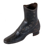 original late 19th century antique american industrial baked-on black enameled ornamental cast iron child's mannequin boot with age appropriate surface wear