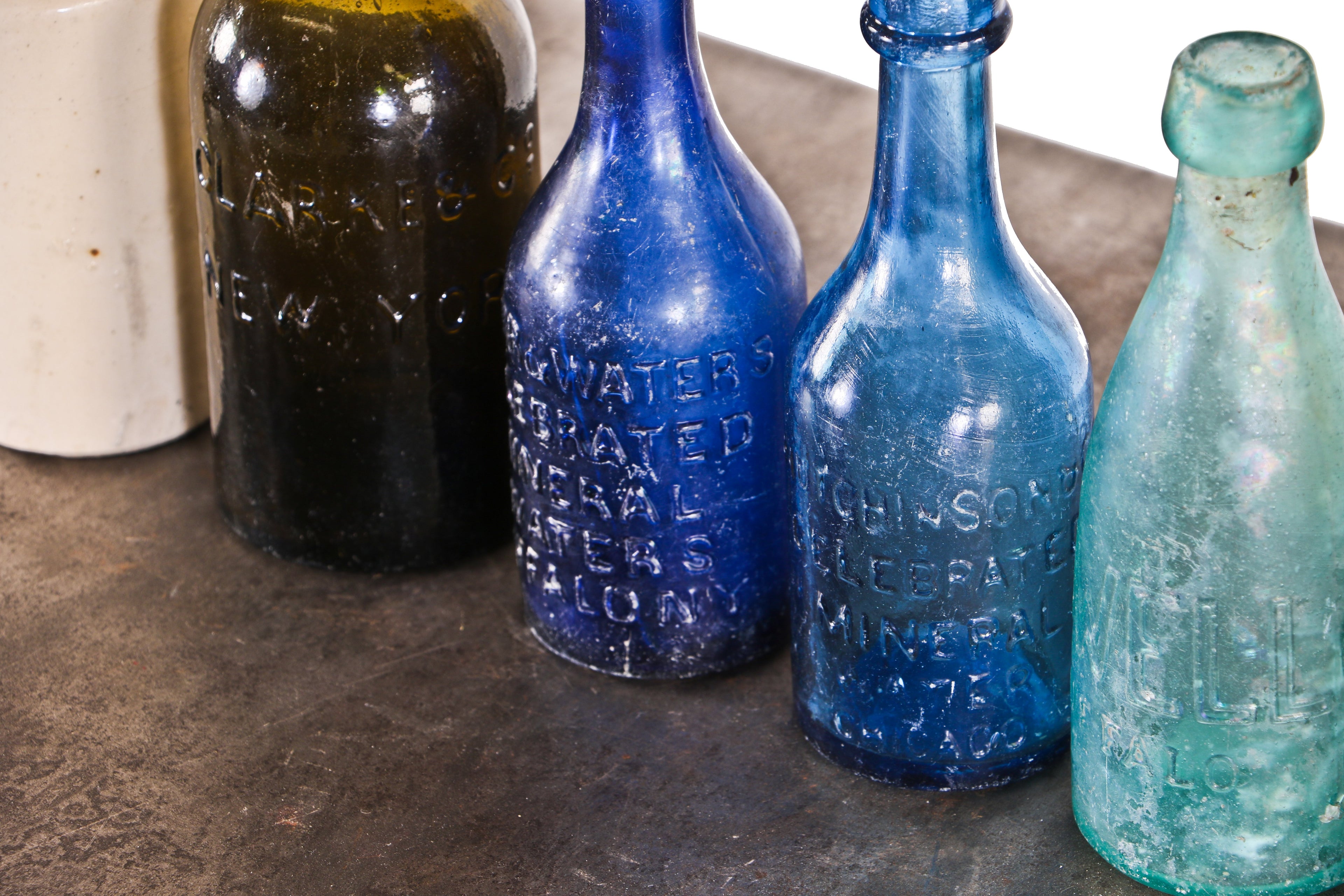 hard to find original and intact cream colored glazed stoneware mead style pottery bottle of unknown origin.