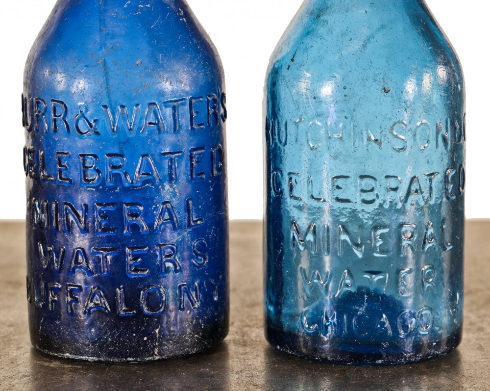 selection of mid-19th century soda, water, and/or ale glass bottles recovered from the chicago riverbed off the shore of wolf point in downtown chicago