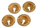 lot of four matching original 19th century ornamental cast bronze circular-shaped interior residential "cup" style pocket door handles with keyholes