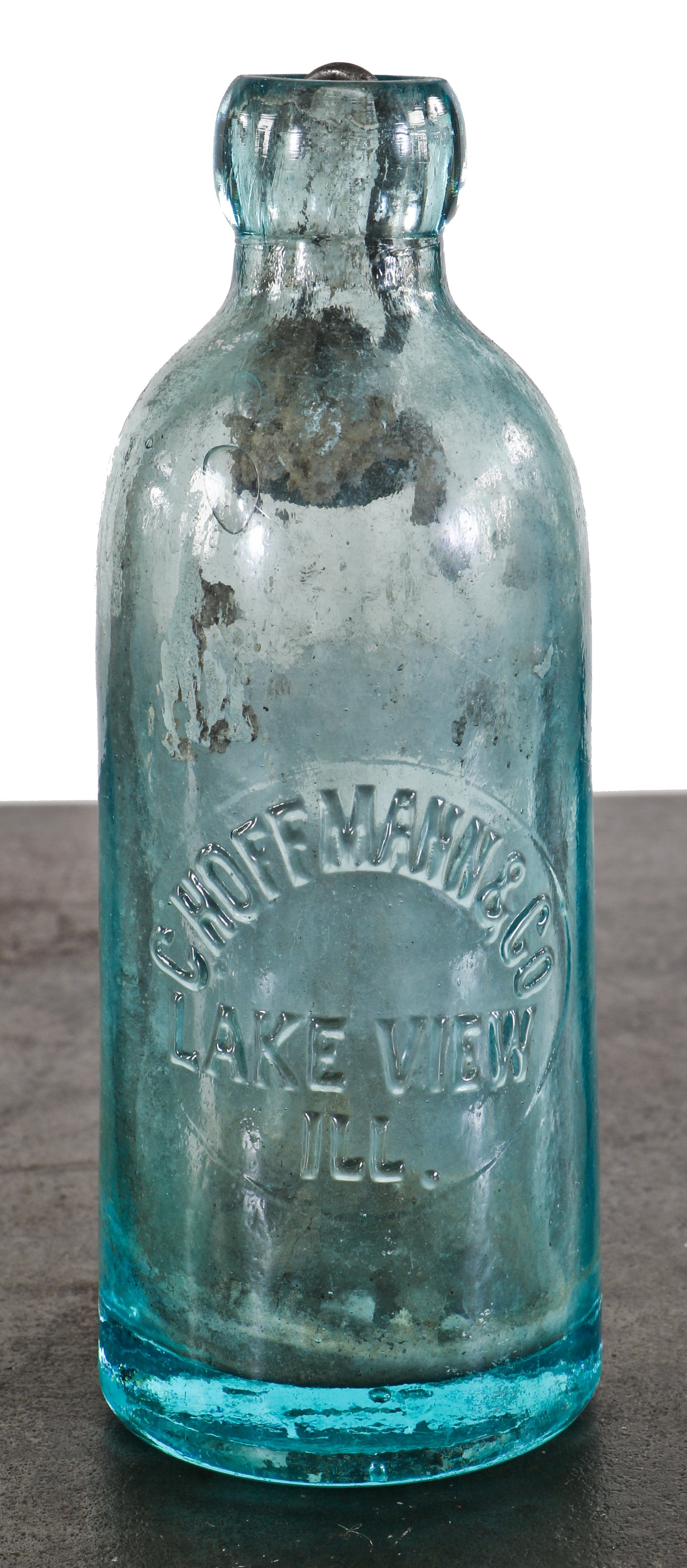 original late nineteenth century blue aqua blobtop hutchinson soda bottle manufactured for conrad hoffmann & co., in lakeview, illinois