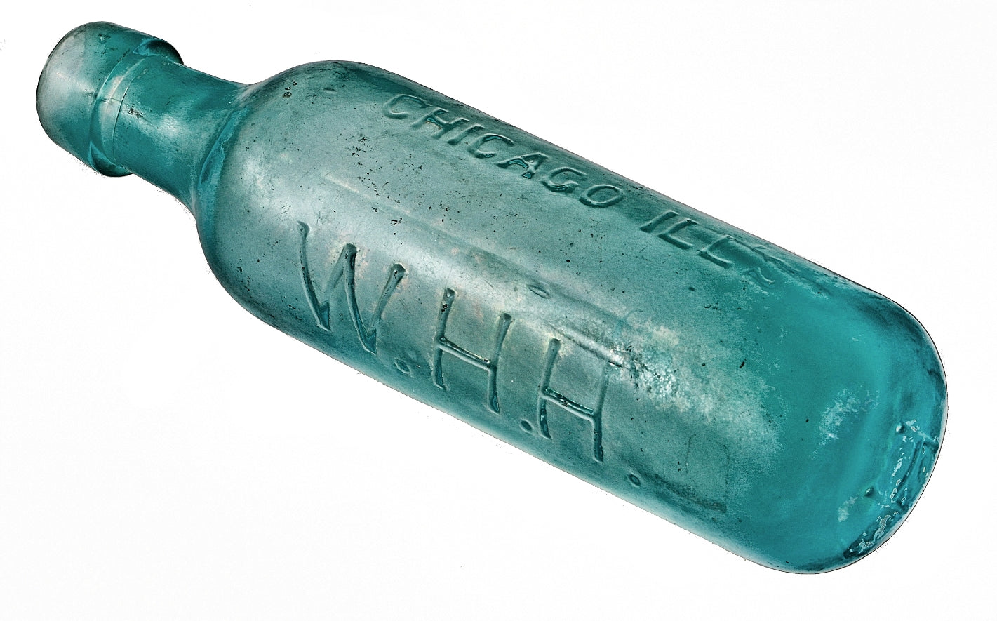 rare and intact c. 1876-78 chicago privy dug deep blue aqua glass soda bottle with semi-round bottom manufactured for chicago bottler william h. hutchinson.