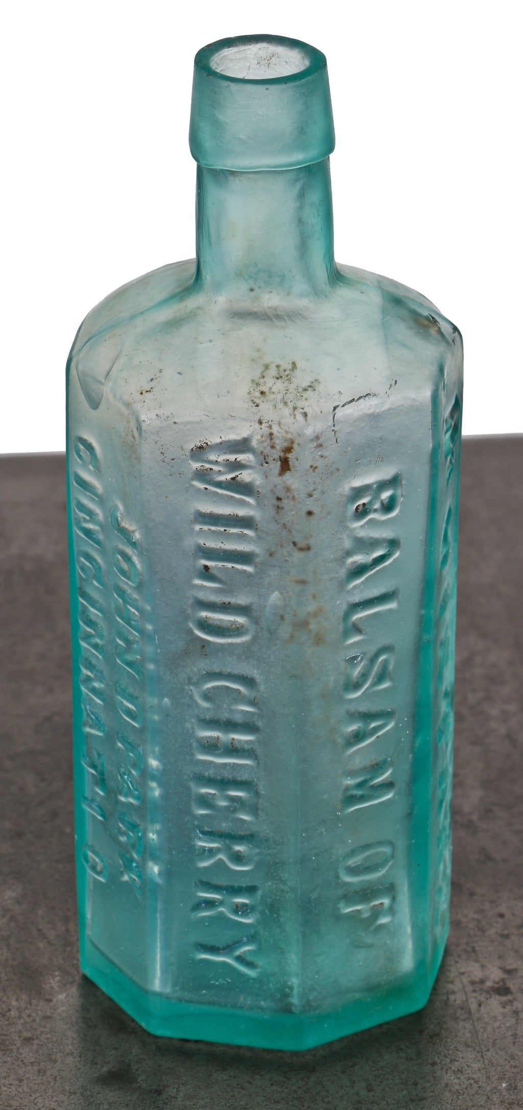 rare and all original mid-nineteenth century deep blue aqua 8-paneled cylindrical dr. wistar's medicinal bottle fabricated for john d. park.