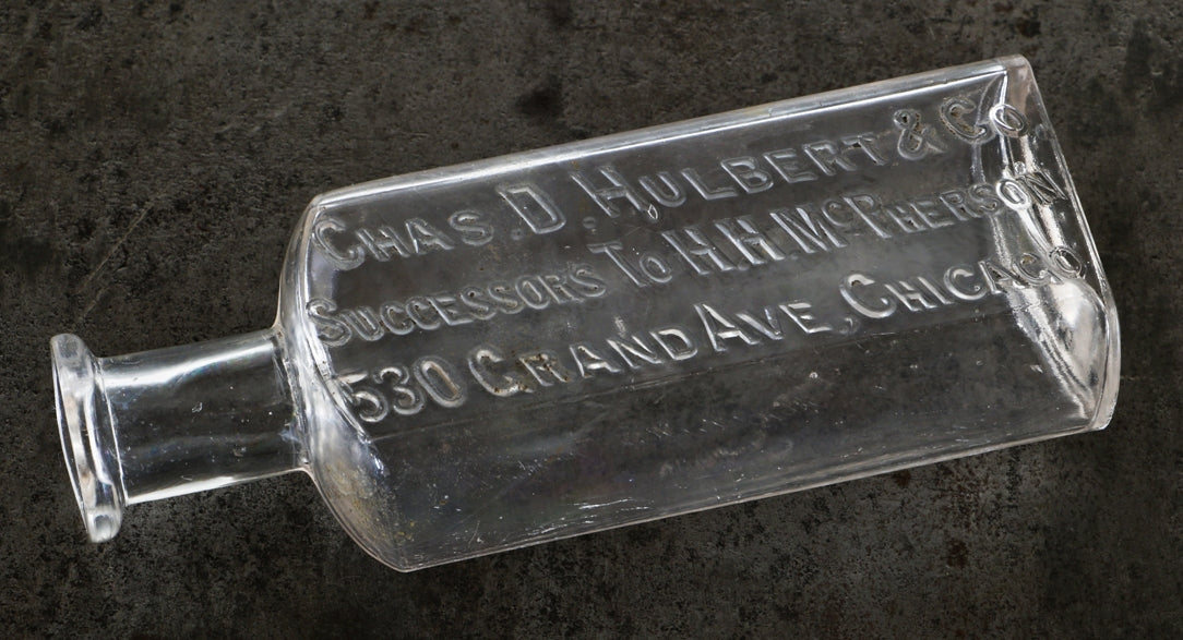 early 20th century diminutive american privy dug charles hulbert chemist and/or druggist clear medicinal bottle with flare lip and embossed lettering