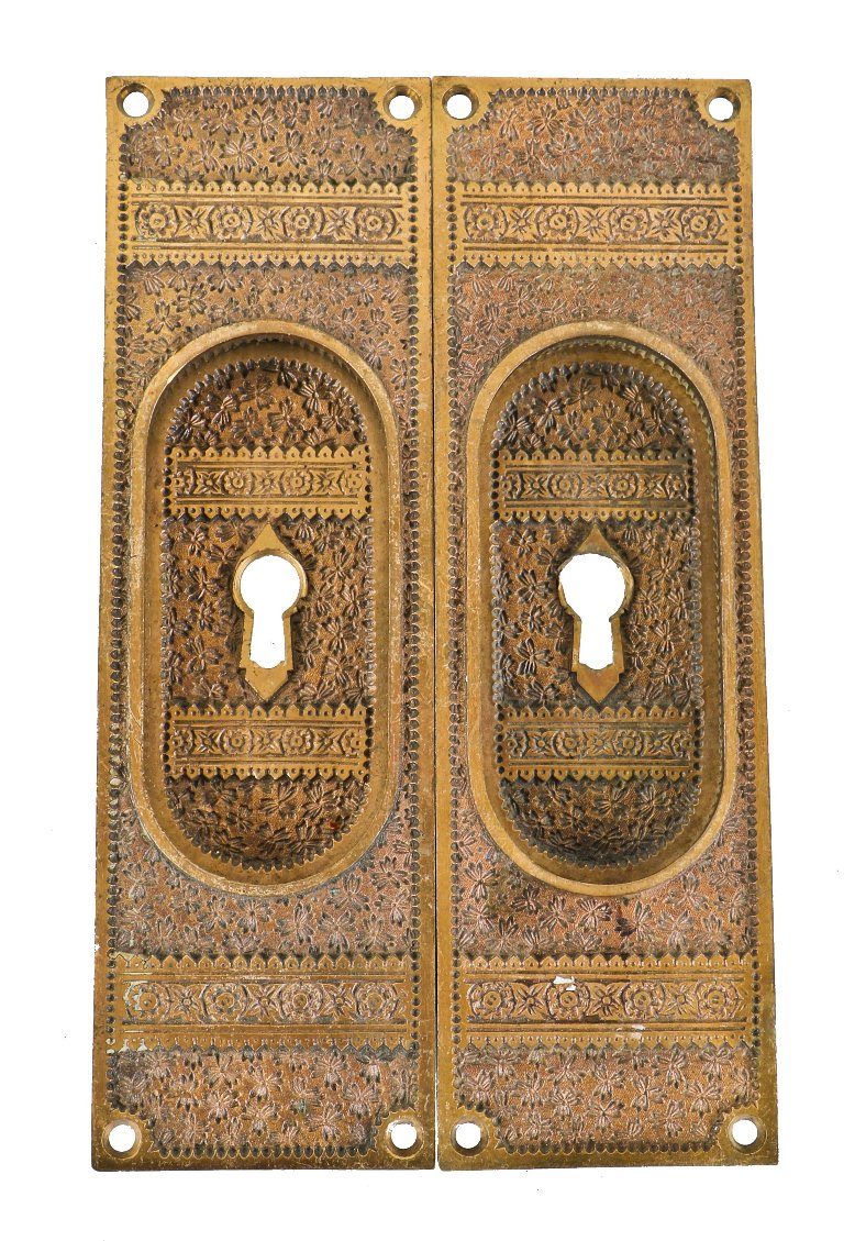 two matching oversized 19th century antique american ornamental cast bronze "ivy" pattern pocket door escutcheons with recessed "cup" handles and keyholes