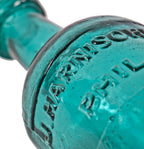 original and intact c. 1850-1860 tumbled teal green glass squat body "j. harnischfeger" mineral or soda water privy dug bottle with deeply embossed lettering
