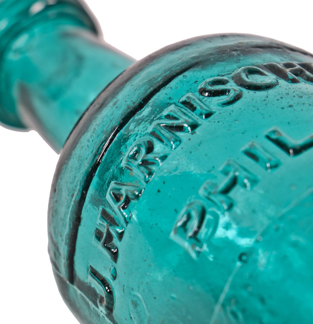 original and intact c. 1850-1860 tumbled teal green glass squat body "j. harnischfeger" mineral or soda water privy dug bottle with deeply embossed lettering