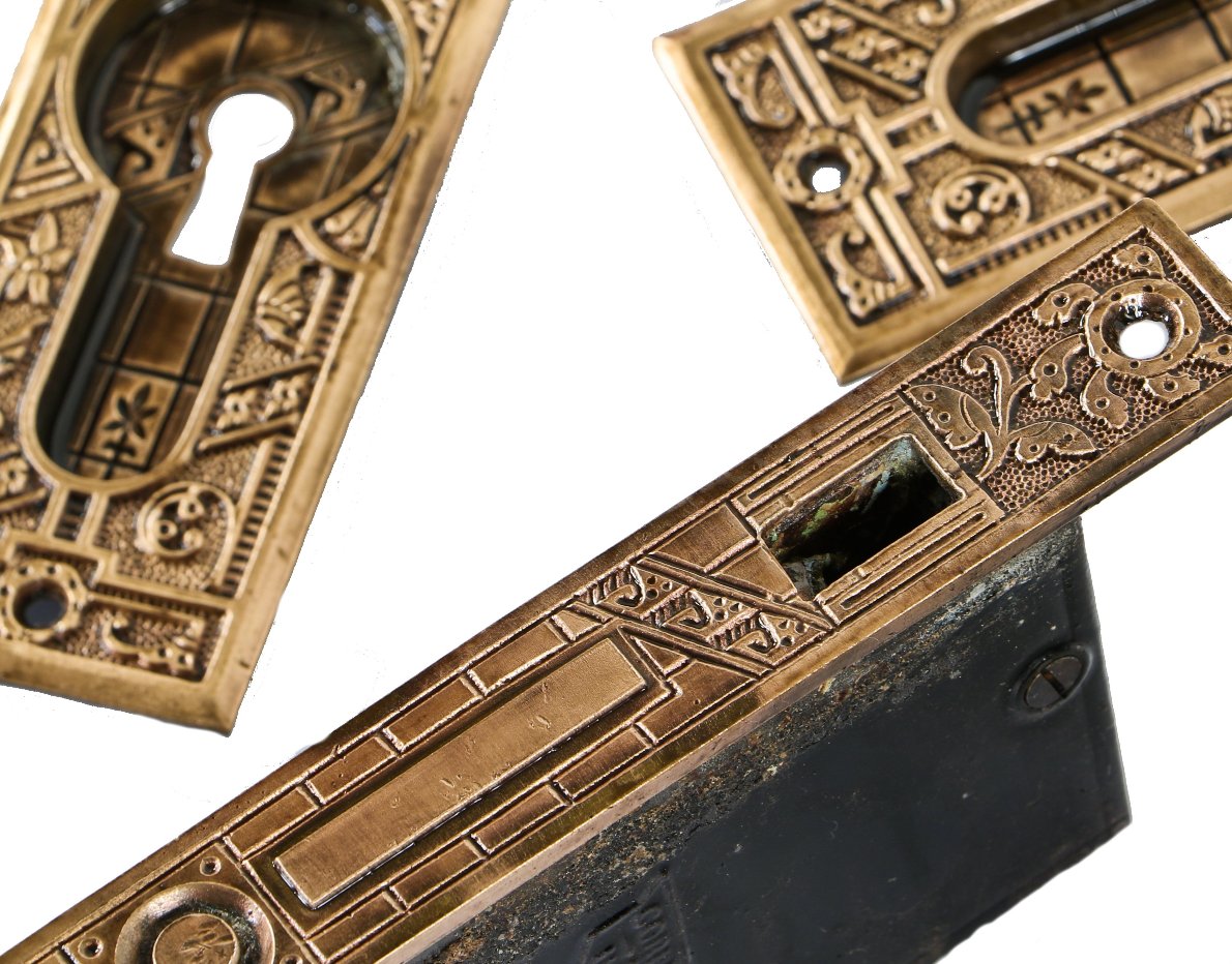 highly desirable c. 1880's antique american eastlake style ornamental cast bronze "ceylon" pattern residential double pocket door matching hardware