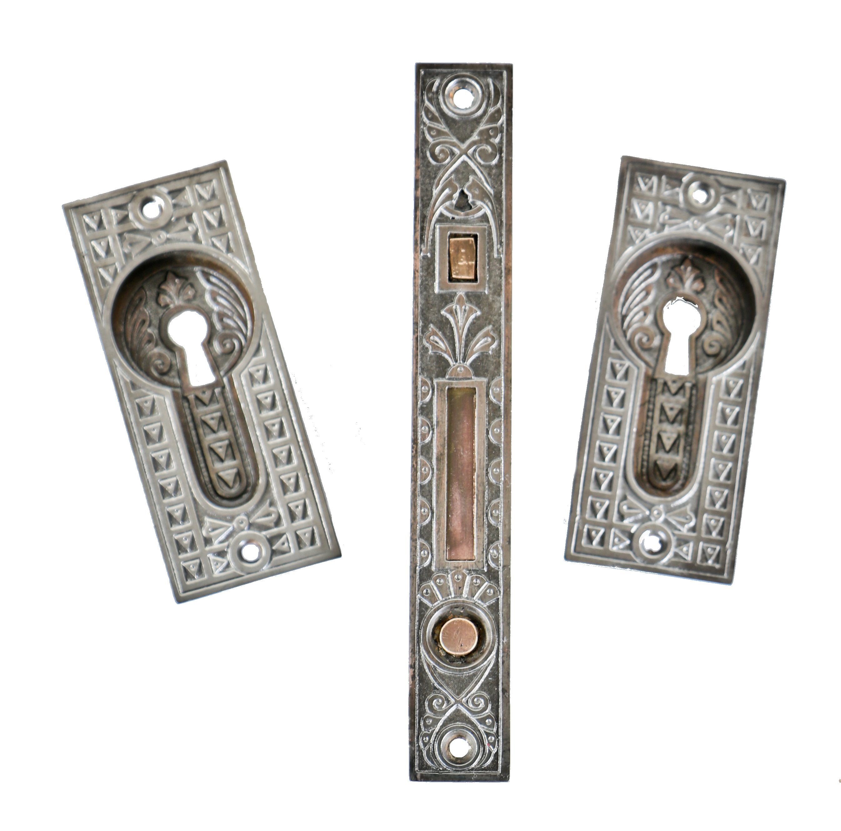 complete single original interior residential 19th century pocket door hardware comprised of ornamented cast iron with cast bronze latch and finger bolt