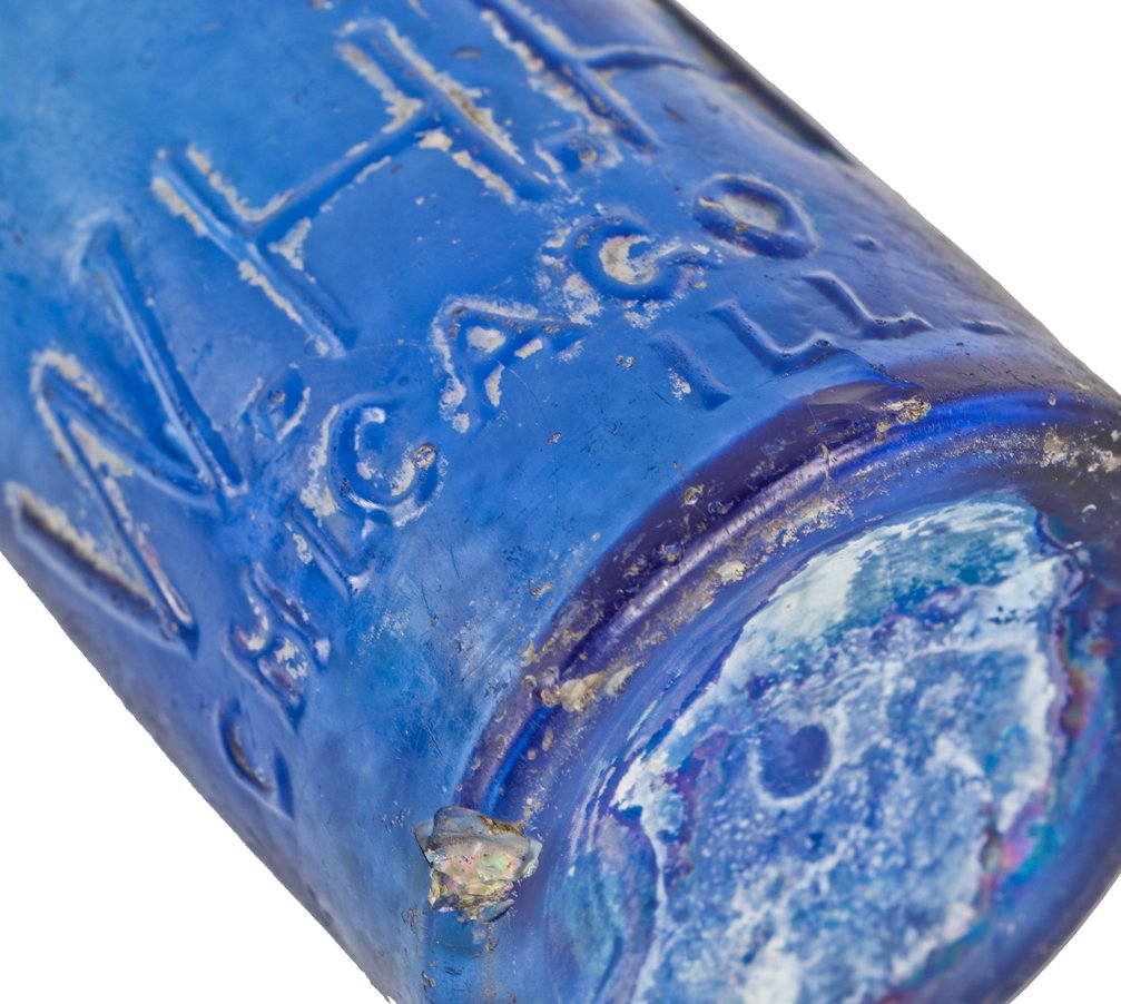 original 1860-63 intact and richly colored cobalt blue low-shouldered pony style embossed glass privy dug carbonated soda water bottle with blob top