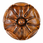 visually striking original and completely intact early 1870's hand carved walnut wood peddled flower with a deeply recessed and centrally located button with incised star