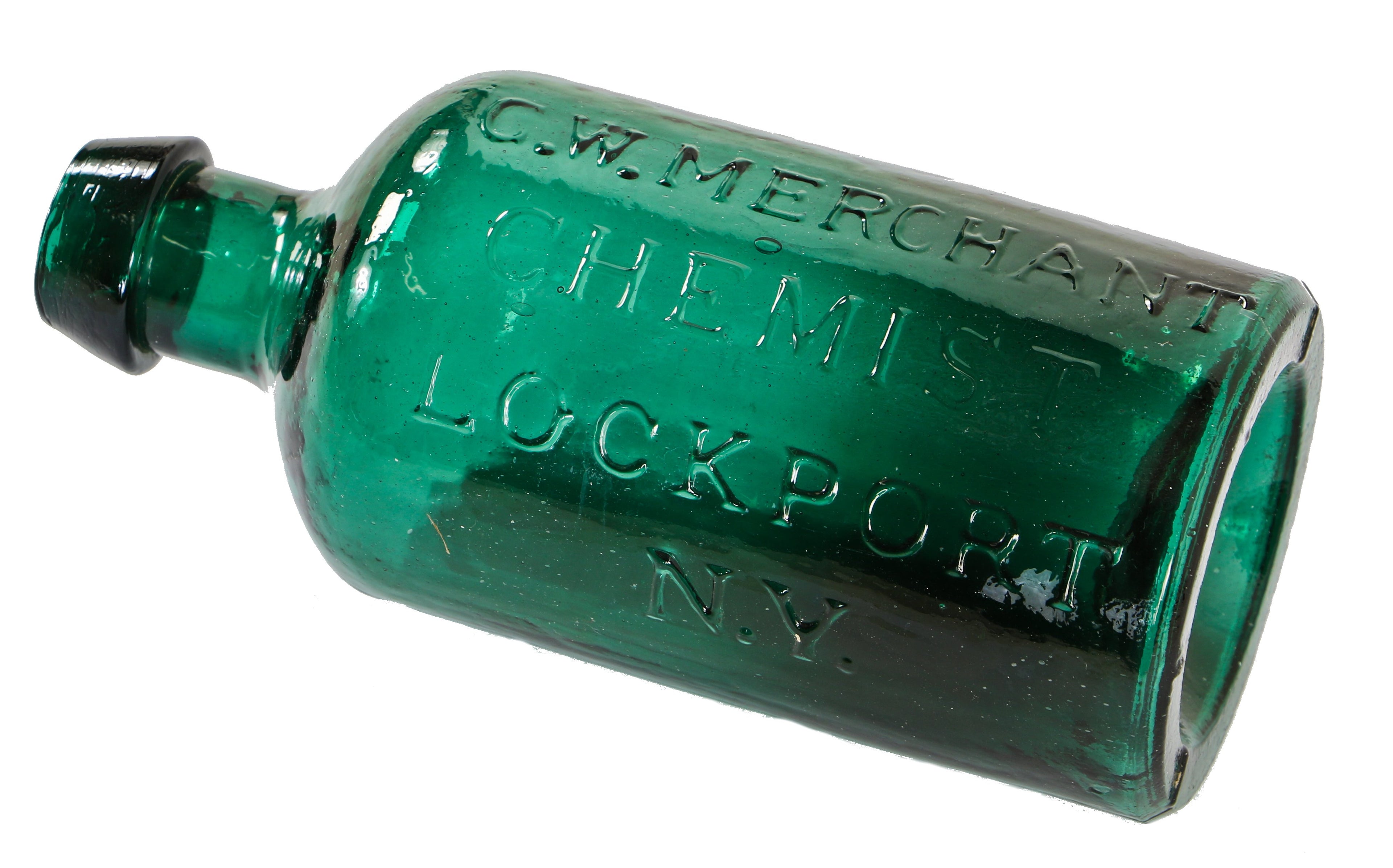 rare mid-nineteenth century vibrantly colored emerald green glass privy dug iron pontiled chemist bottle manufactured for george w. merchant in lockport, n.y.