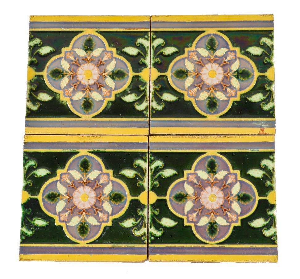 original 19th century vibrantly colored majolica glazed david c. cook mansion interior second floor fireplace border tiles with symmetrically-arranged floral motifs