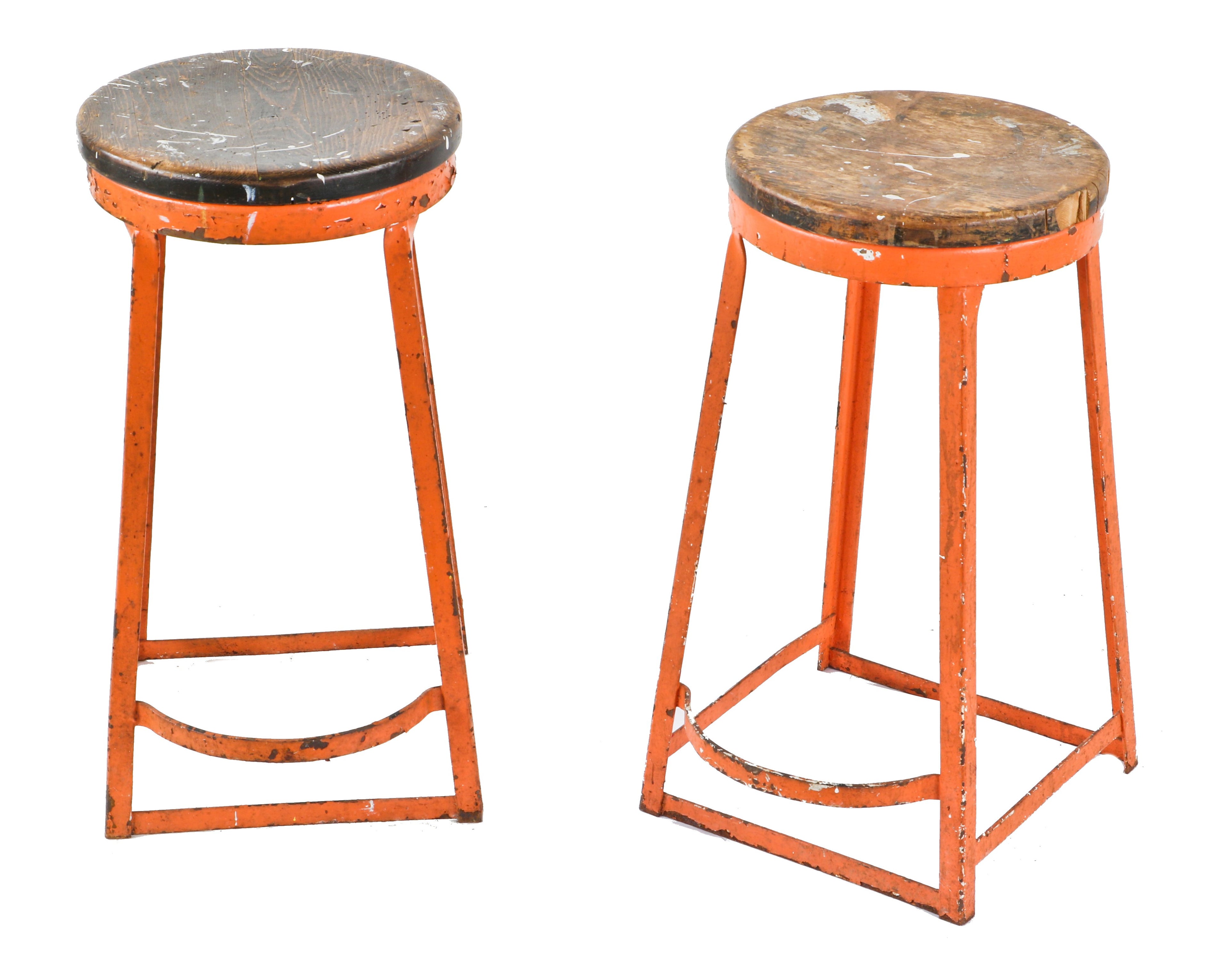 two matching original late 1930's american industrial weathered and worn orange painted factory machine shop stool with wood seats and protruding footrests