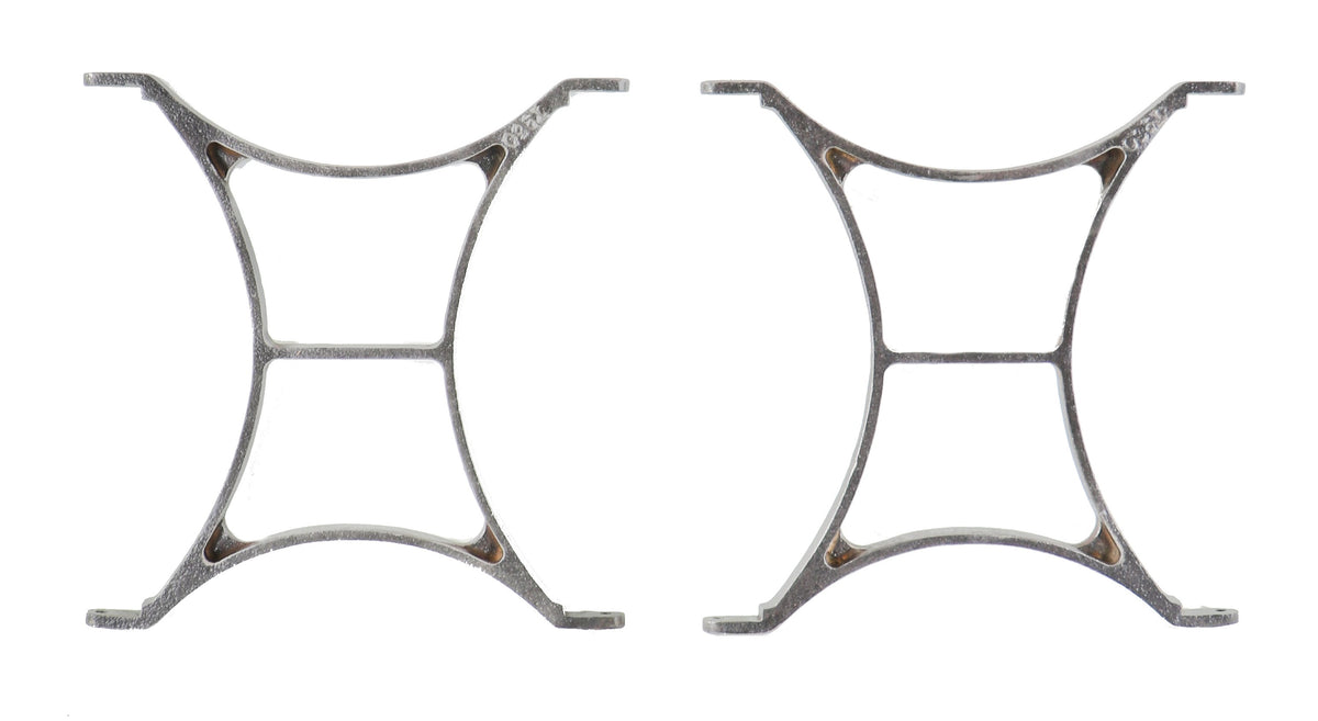 two early 20th century american industrial matching unusually-shaped cast iron low-lying table bases with flared edges containing pre-drilled holes for mounting purposes