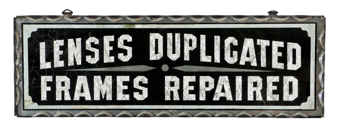 rare original early 20th century oversized reverse-painted easel back "lens duplicated" optician scalloped edge glass sign with hanger