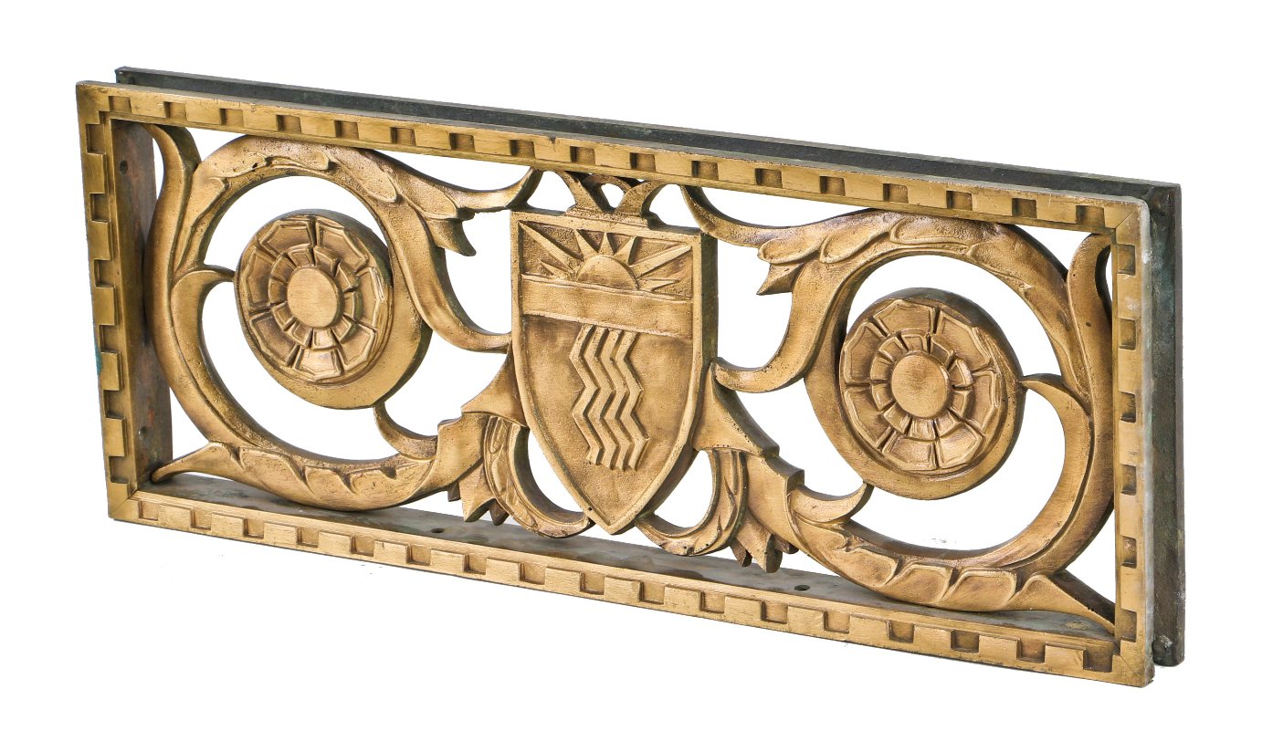 very rare all original c. 1920's american ornamented double-sided cast bronze medinah athletic club exterior entrance door grille with starburst motif shield