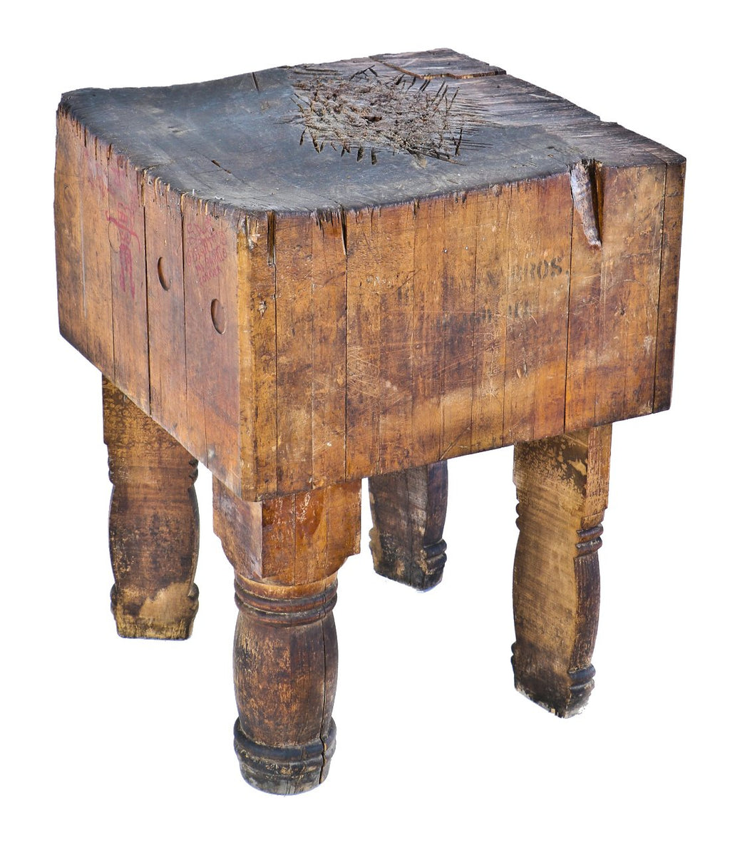 incredibly robust and heavy duty heavily worn turn of the century rock hard maple wood freestanding four-legged fulton market butcher shop table