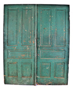 matching set of early all original and unrestored pre-fire chicago green painted raised panel pine commercial building second floor wood swing-out doors